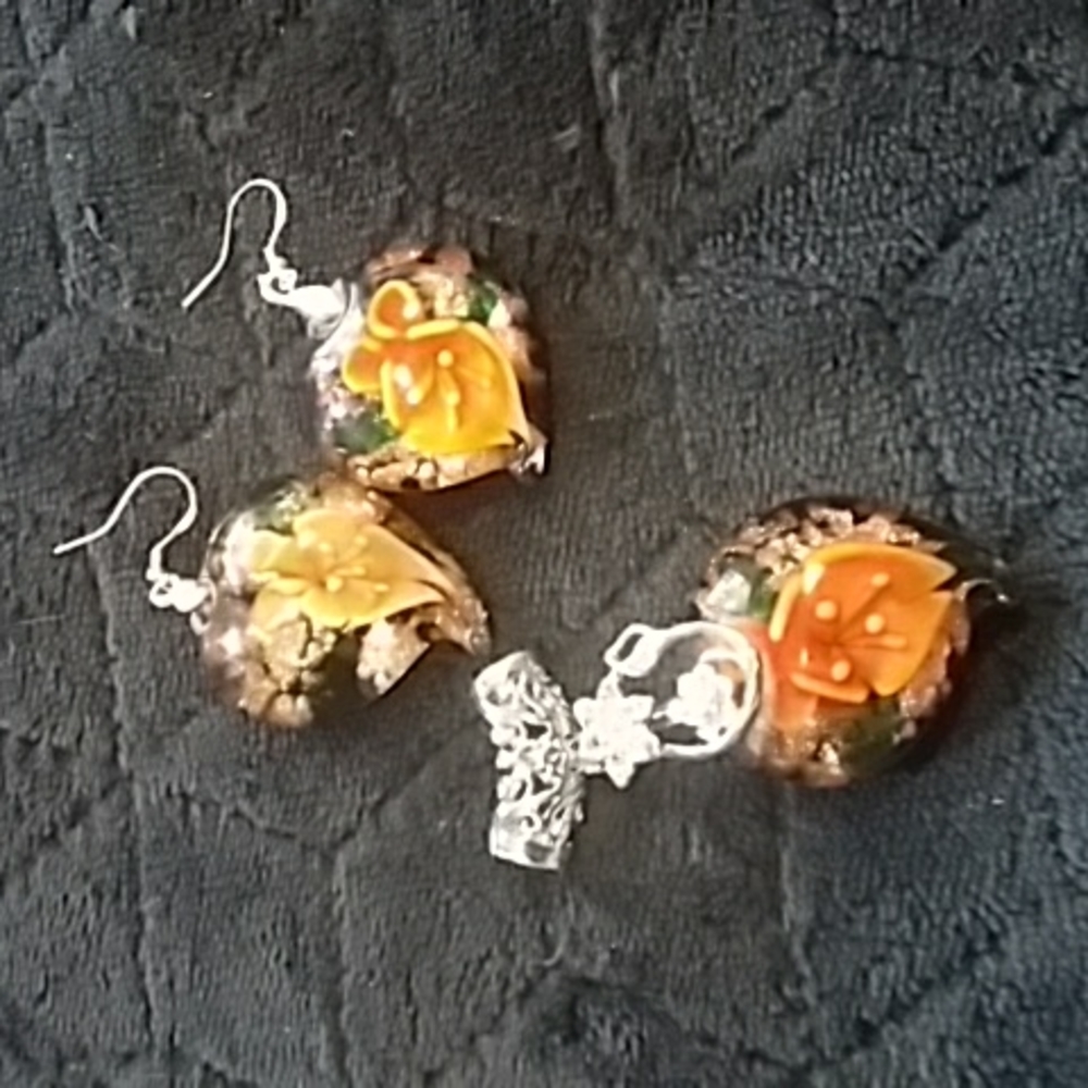 Pendant and earrings